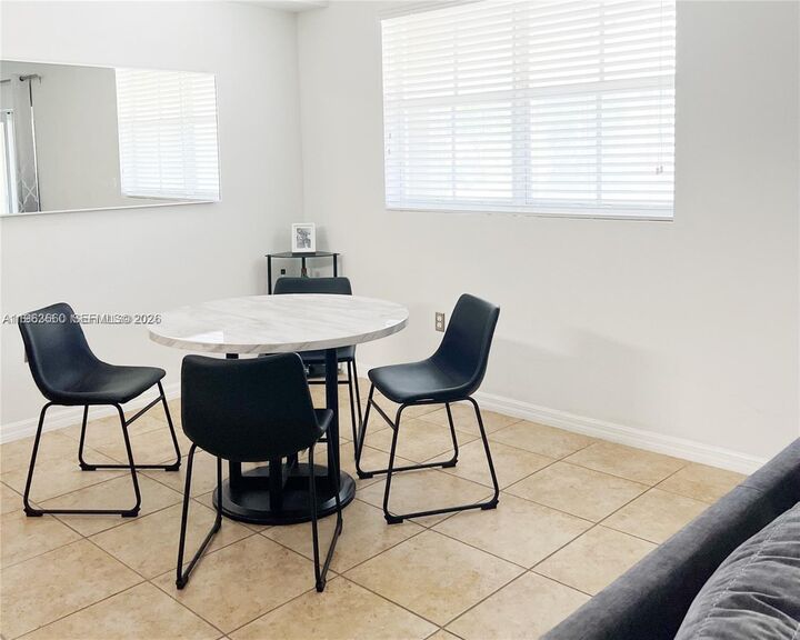 Property Photo: 8800 NW 107th Ct 211 FL 33178