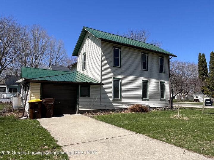 Property Photo:  132 Washington Street  MI 48853 