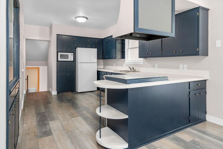 Property Photo:  320 3rd Street NE  MN 56310 