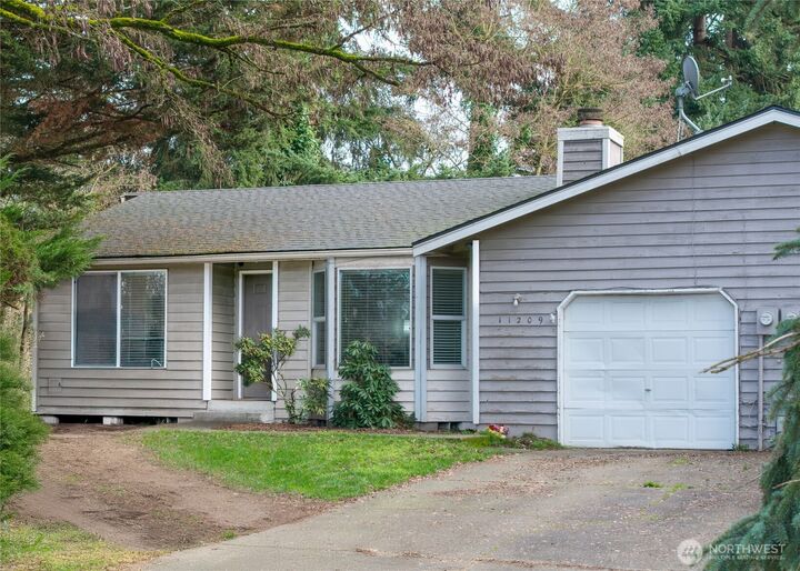 Property Photo:  11209 11211  89th Ave Court E  WA 98373 