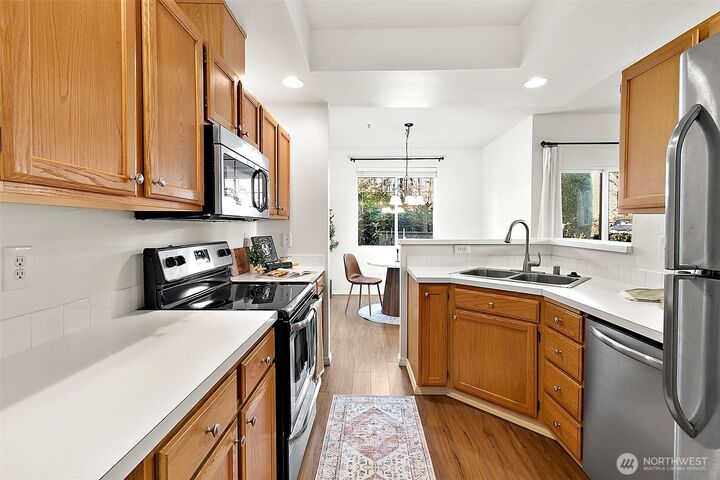Property Photo:  4710  Mill Pond Dr  SE 304  WA 98092 