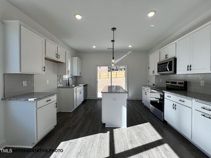 Property Photo:  532 Springtooth Drive  NC 27597 