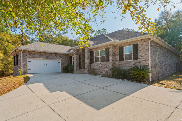 Property Photo:  5777 Wildwood Road  FL 32536 