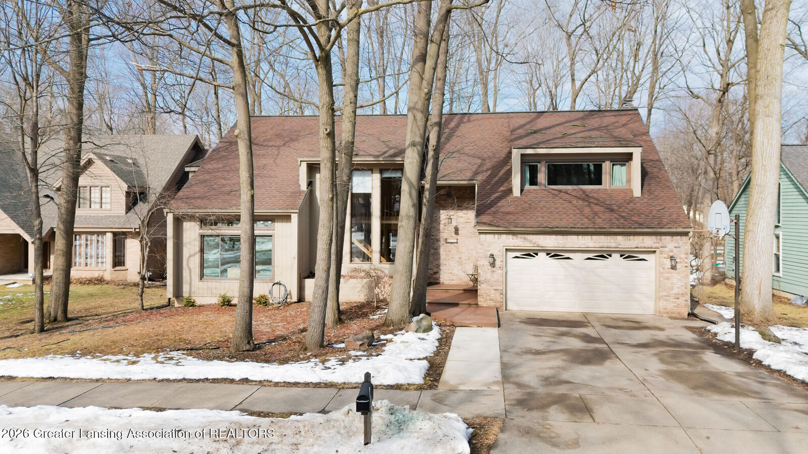 Property Photo:  1986 Thistlewood Road  MI 48864 