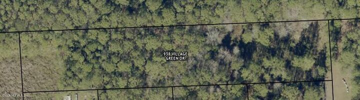 Property Photo: 938 Village Green Drive FL 32234