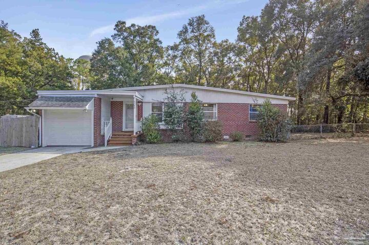 Property Photo:  6589 Cedar St  FL 32570 