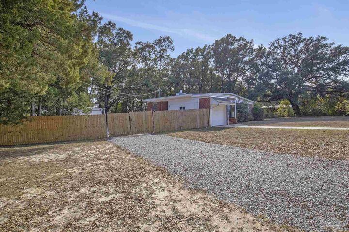 Property Photo:  6589 Cedar St  FL 32570 