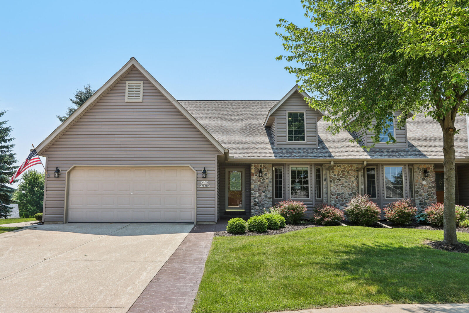 Property Photo:  W203n16184 Pin Oak Cir  WI 53037 