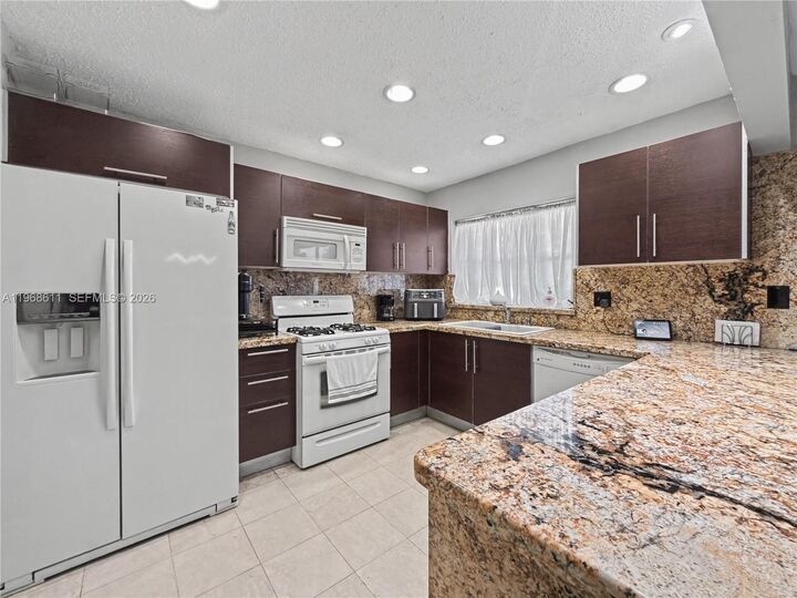 Property Photo:  10491 SW 122nd Ct  FL 33186 