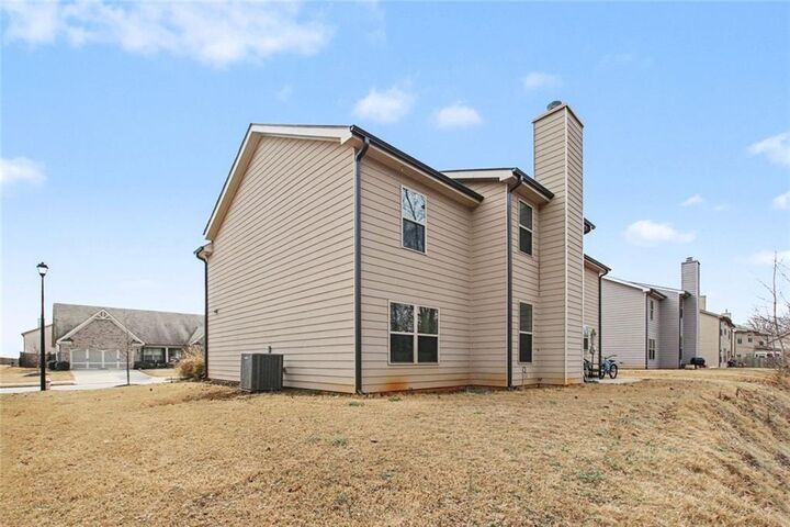 Property Photo:  1084 Scarlet Sage Circle N  GA 30011 