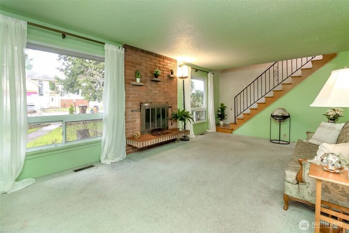 Property Photo:  215 E 48th Street  WA 98404 