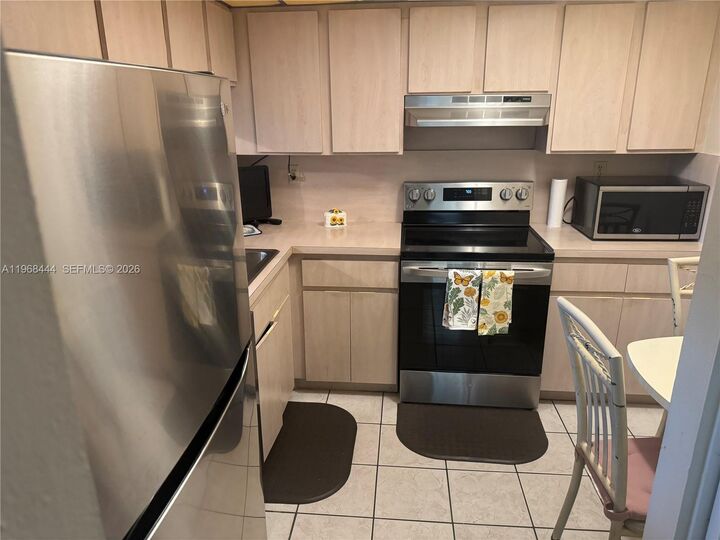Property Photo:  11750 SW 18th St 313-1  FL 33175 