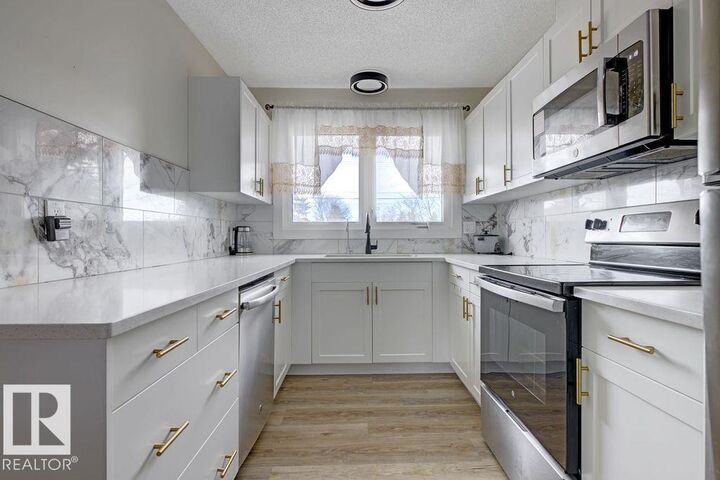 Property Photo: 13211 71 Street NW AB T5C 0M7