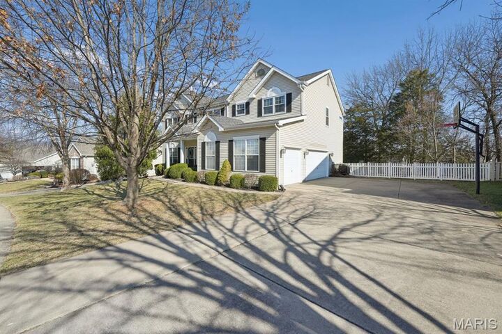 Property Photo:  2026 Avalon Mist Circle  MO 63368 