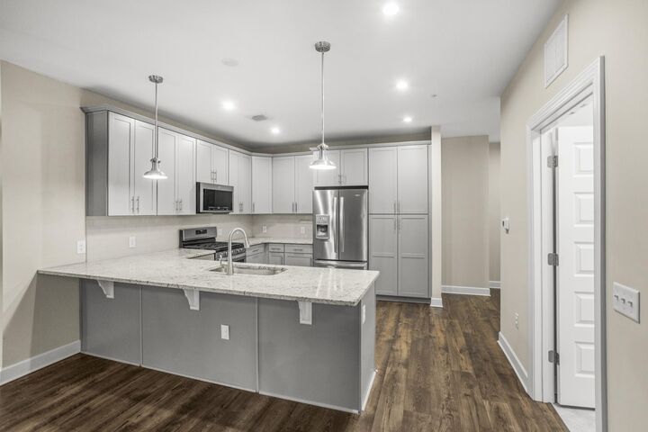 Property Photo: 141 Saundersville Rd 1402 TN 37075