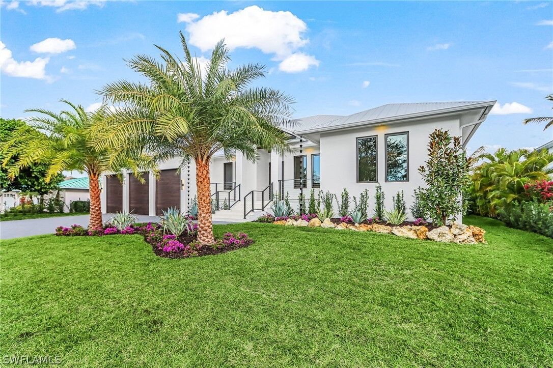 Property Photo:  2393 Longboat Drive  FL 34104 