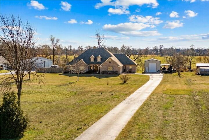 Property Photo:  1701 Elm Springs Road  AR 72762 