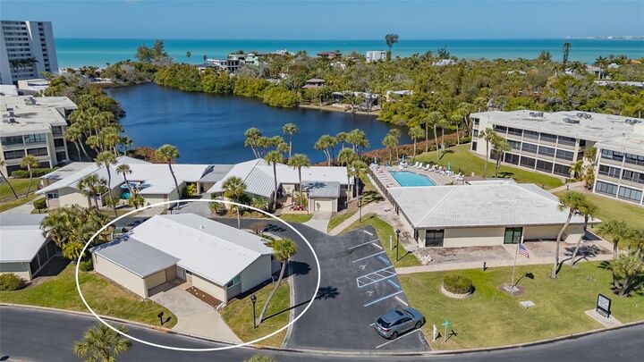 Property Photo:  113 Whispering Sands Drive V47  FL 34242 