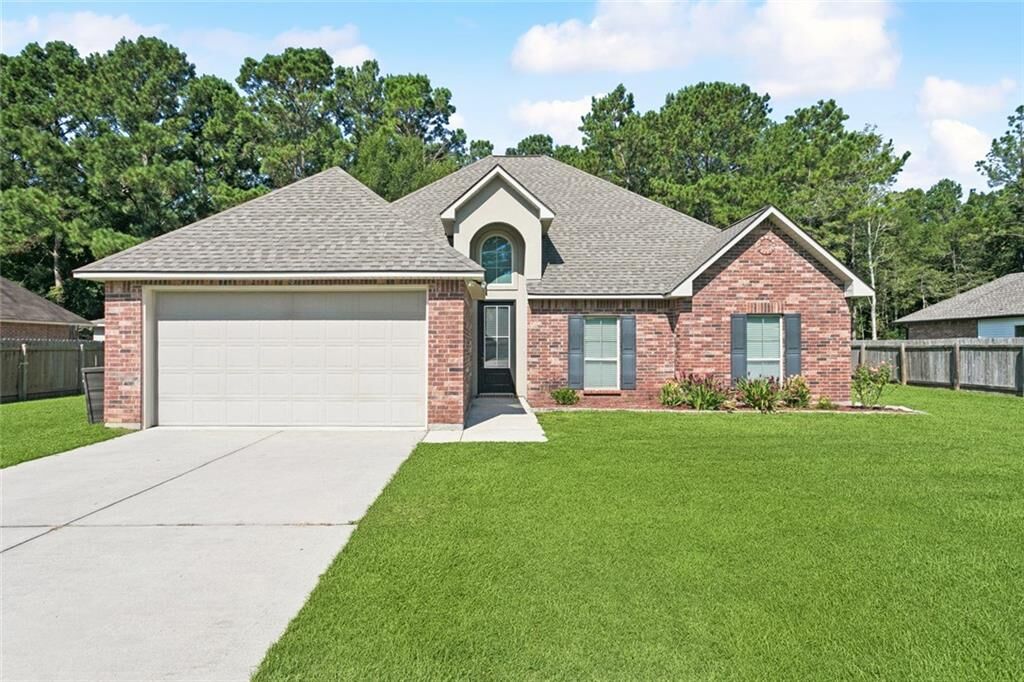 Property Photo: 341 Coconut Palm Drive LA 70447
