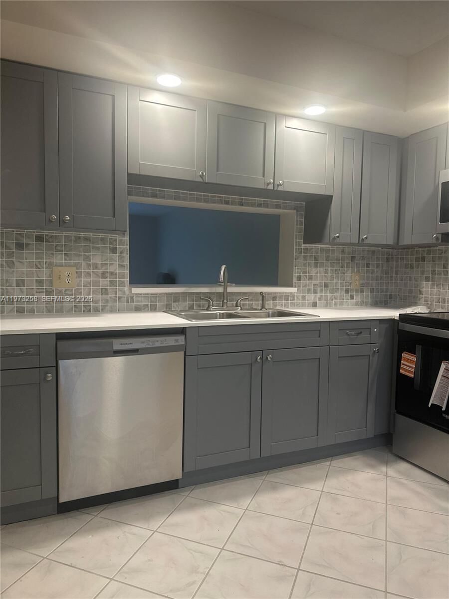 Property Photo:  12800 SW 7th Ct 306G  FL 33027 