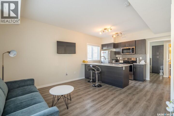 Property Photo: 203A 3351 Green Poppy Street SK S4V 3P6