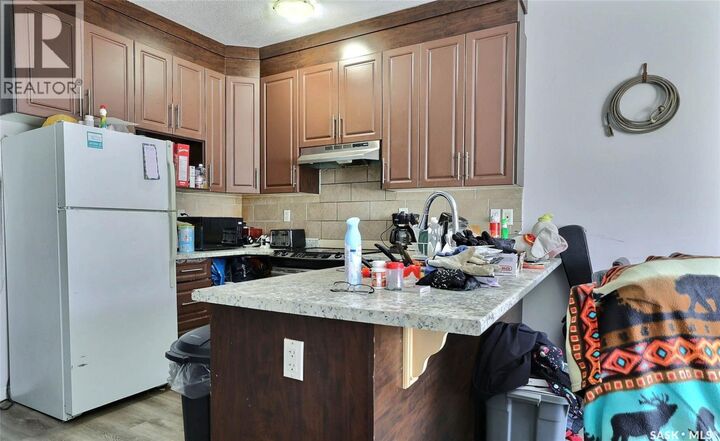 Property Photo:  1135 McTavish Street  SK S4T 3V6 