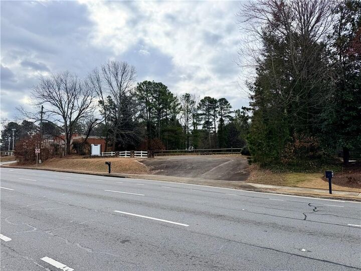 Property Photo:  1400 Woodstock Road  GA 30075 