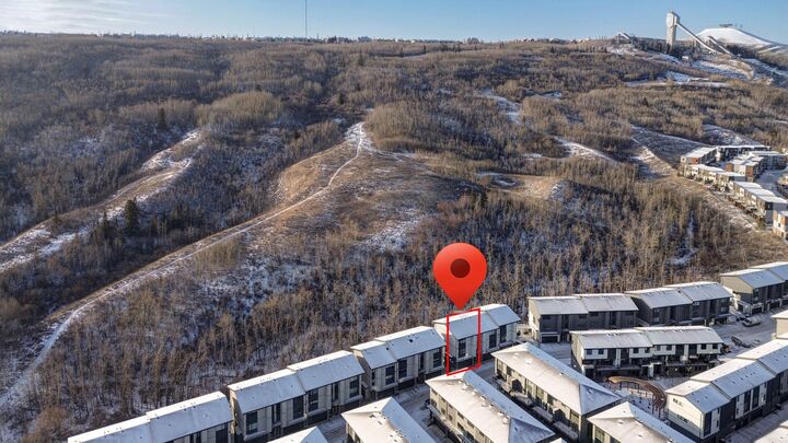 Property Photo: 1453 Naa Drive SW 62 AB T3H 6H7