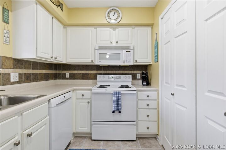 Property Photo:  40 Lighthouse Road 102  MO 65049 