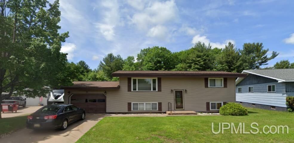 Property Photo:  108 Woodland Drive  MI 49866-1510 