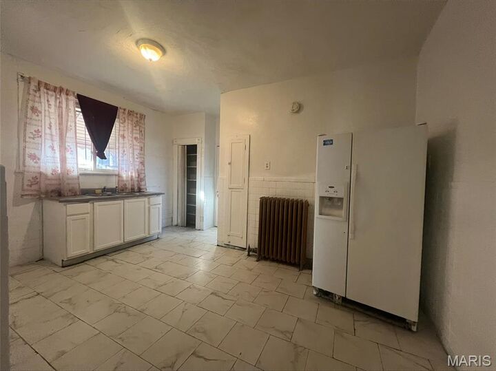 Property Photo:  5929 Lucille Avenue  MO 63136 