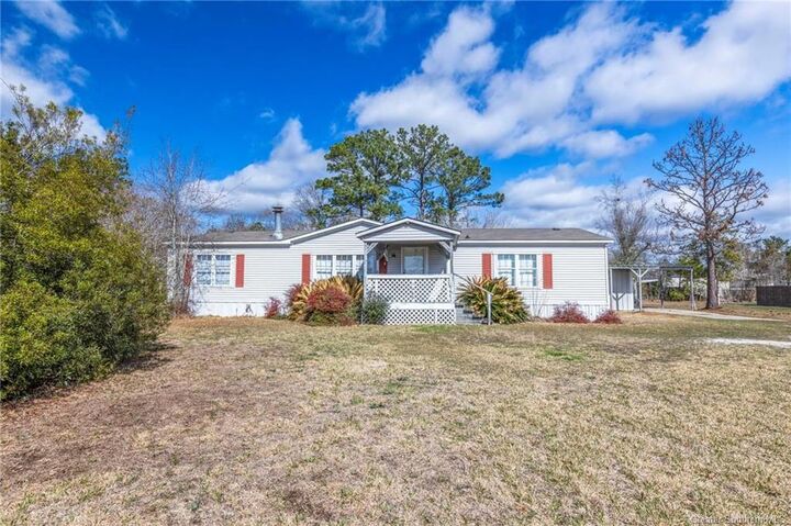 Property Photo:  831 W Houston River Road W  LA 70663 