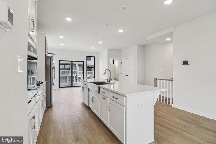 Property Photo:  5008 Henry King Way 16F  MD 20715 