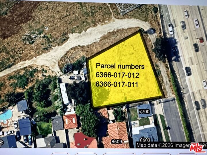 Property Photo:  7700 Bangle Rd  CA 90240 