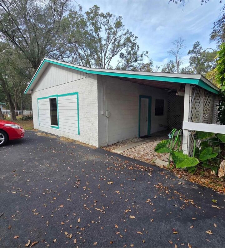 Property Photo:  20111 Old Trilby Road  FL 33523 