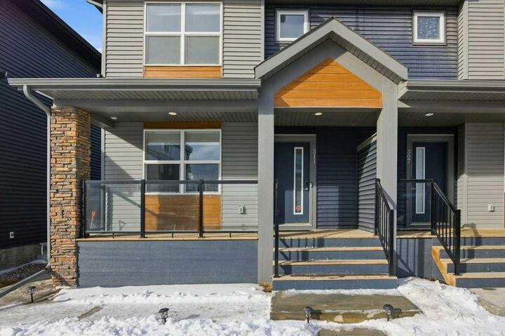Property Photo: 311 Wolf Creek Way SE AB T2X 4Y8