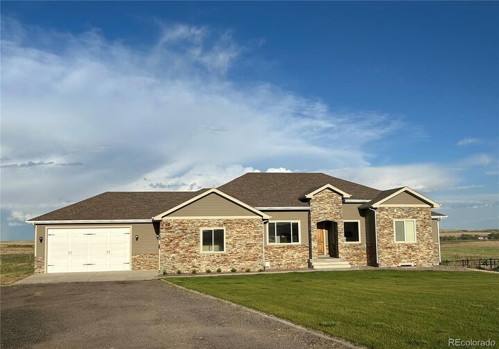 Property Photo: 45425 Wolf Creek Drive CO 80102