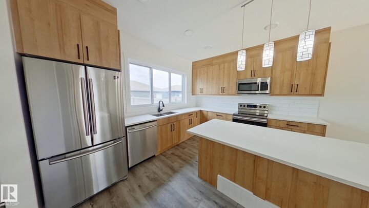 Property Photo: 5715 Hawthorn Common SW Main AB T6X 2L5