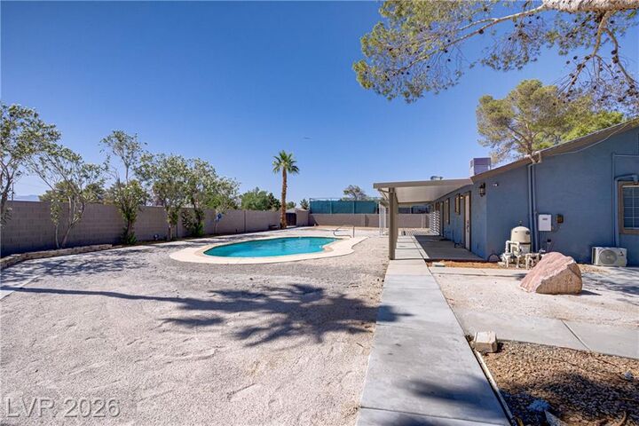 Property Photo:  4490 West Warm Springs Road  NV 89118 