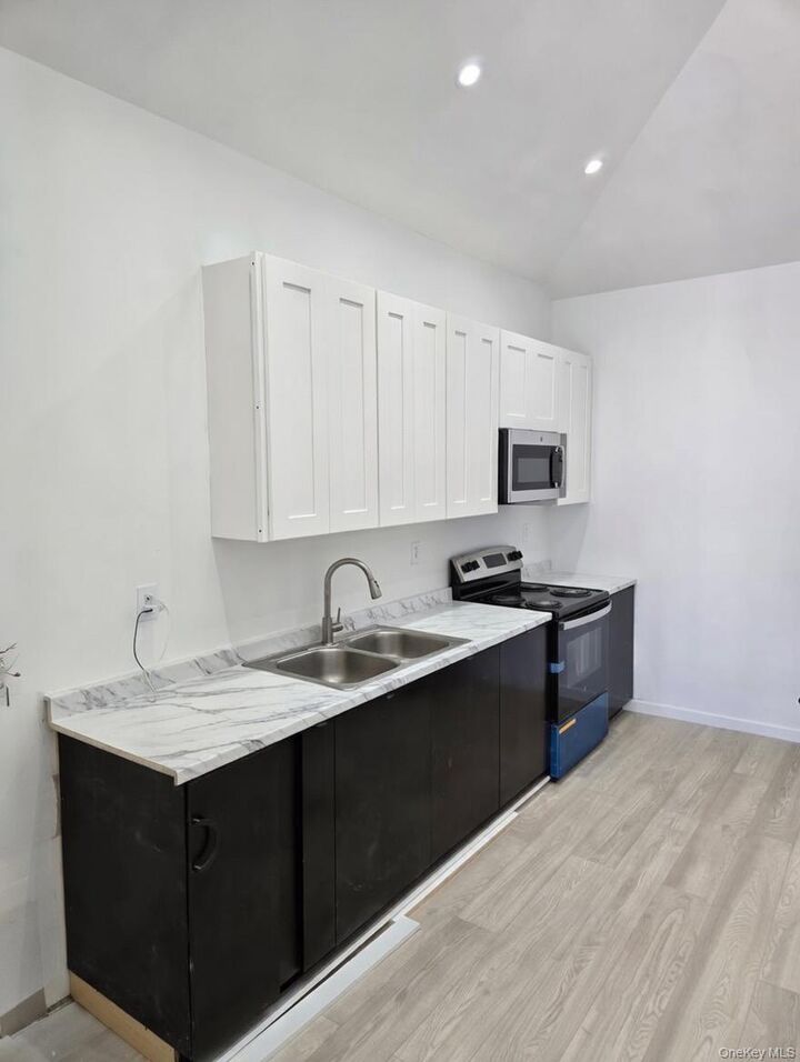 Property Photo:  267 Morris Avenue  NY 11096 