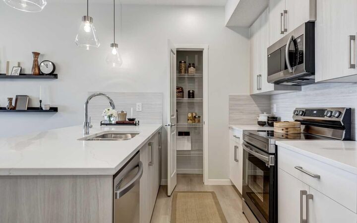 Property Photo: 20295 Seton Way SE 2111 AB T3M 3Y9