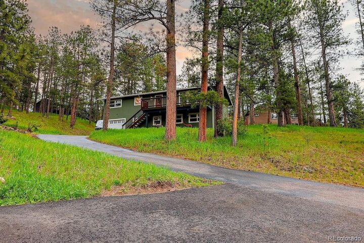 Property Photo:  5237 S Olive Road  CO 80439 