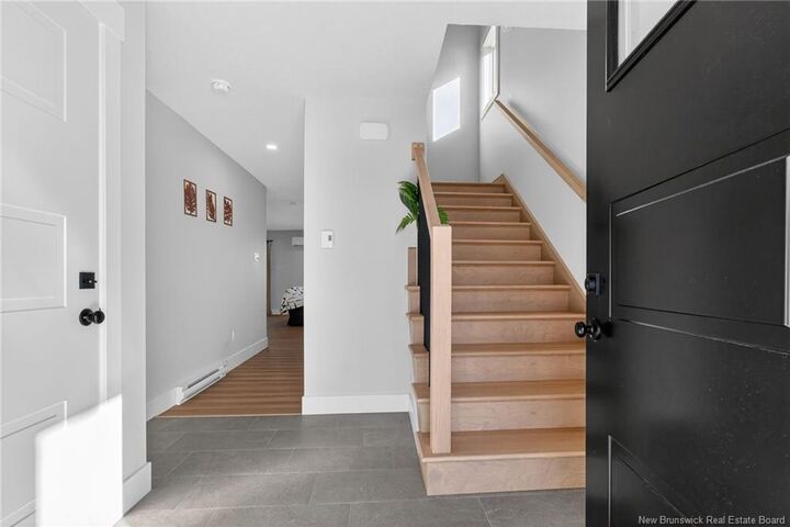 Property Photo: 203 Teaberry Avenue NB E1G 0E8