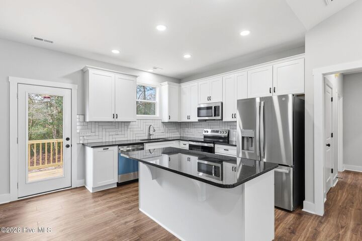 Property Photo:  8040 Rachel Wynd Road NE  NC 28451 