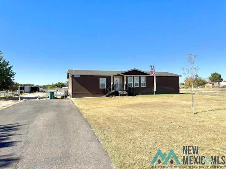 Property Photo:  1411 Tokay Avenue  NM 88220 