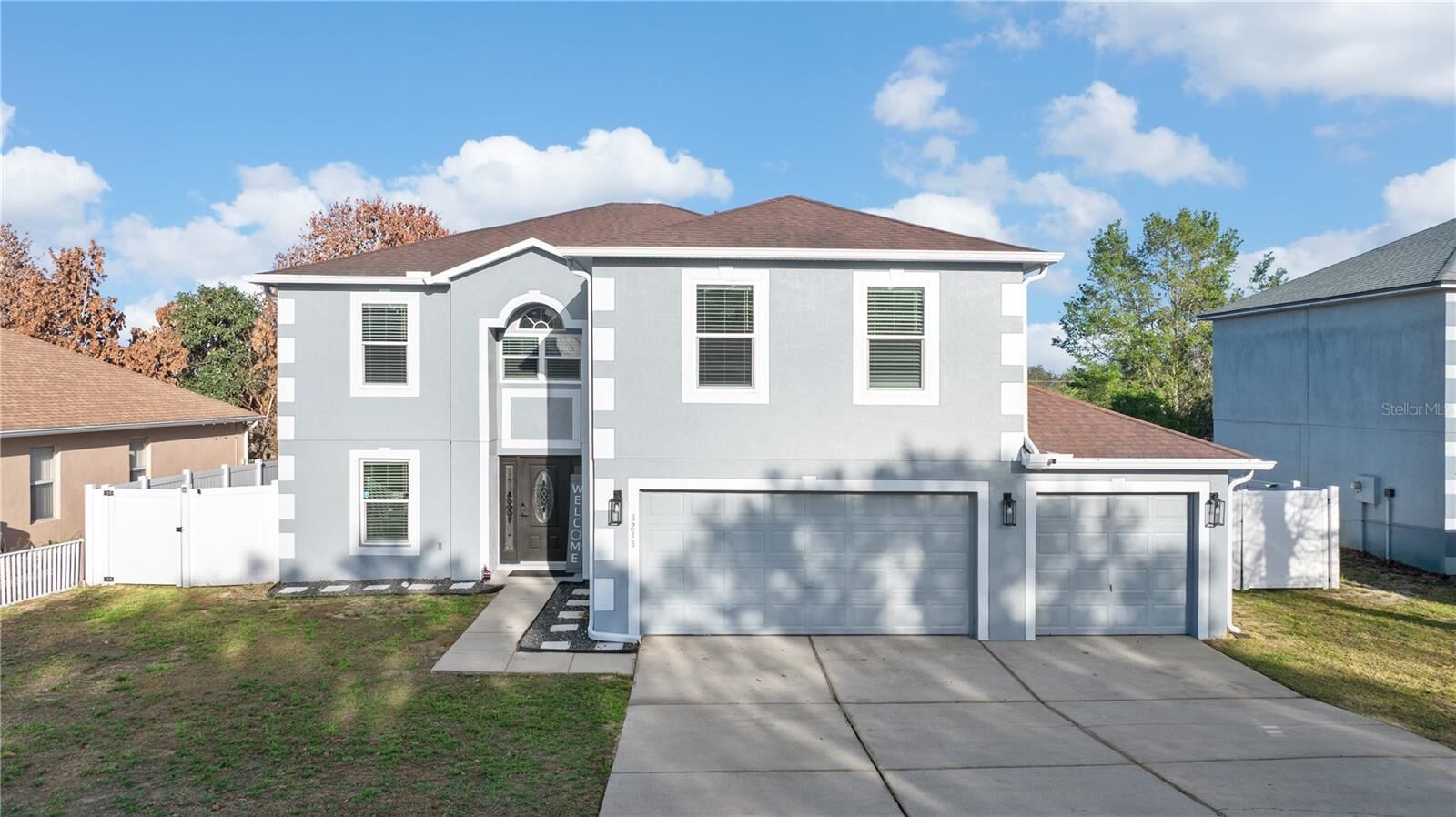 Property Photo: 3233 White Blossom Lane FL 34711
