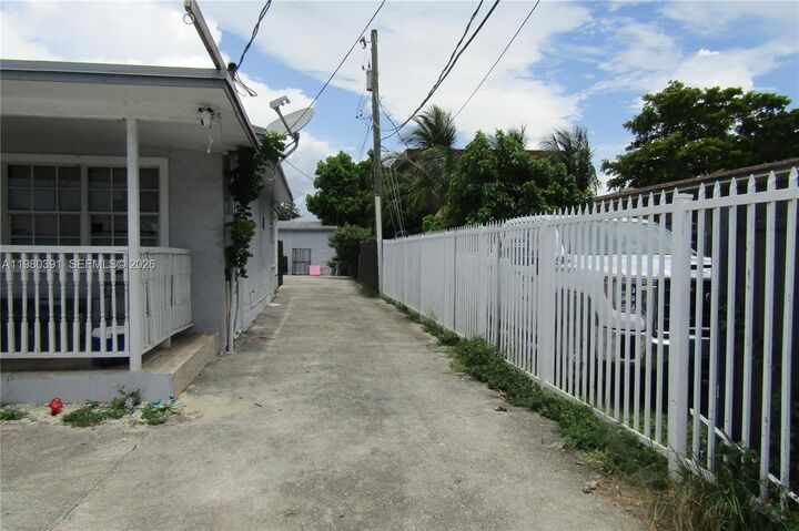 Property Photo:  2223 NW 32nd St  FL 33142 