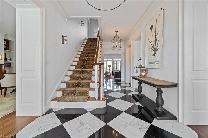 Property Photo:  208 Willoughby Boulevard  NC 27408 