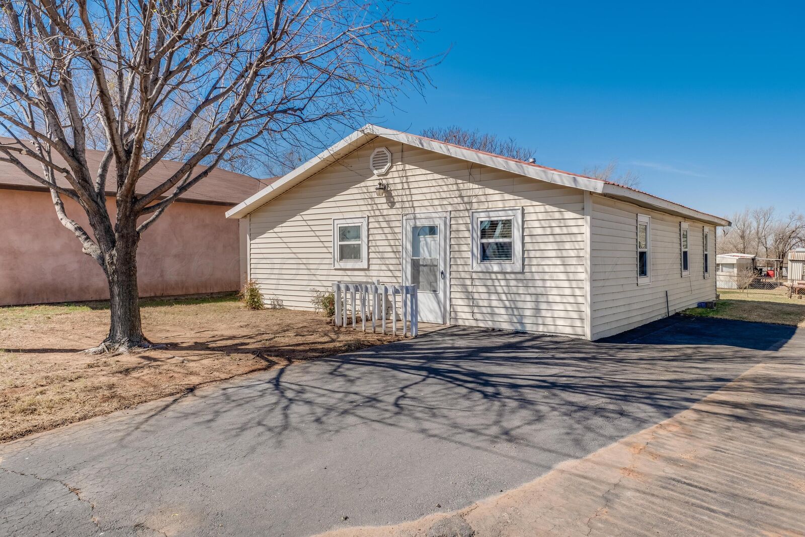 Property Photo: 106 S Canadian Street TX 79096