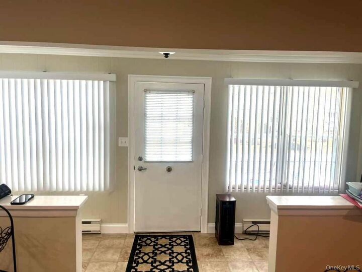 Property Photo:  395 Woodbridge Drive C  NY 11961 